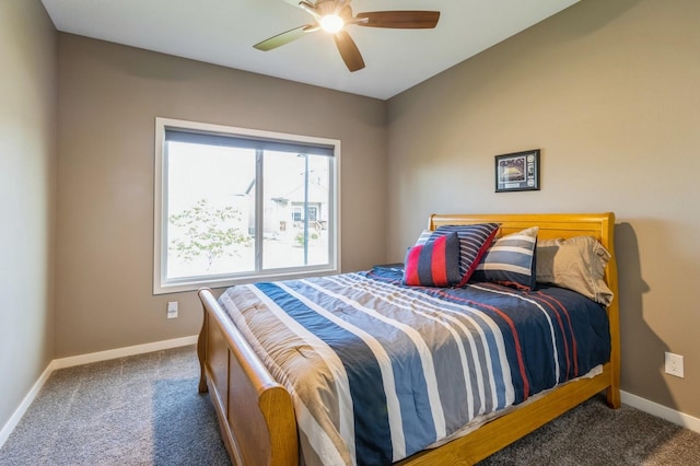 5645 Prairie Grass Dr, Johnston, IA 50131 - carpeted bedroom featuring baseboards and a ceiling fan