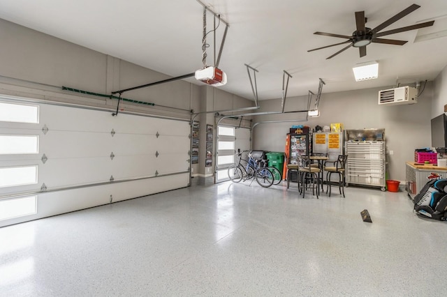 5645 Prairie Grass Dr, Johnston, IA 50131 - garage featuring a garage door opener and ceiling fan