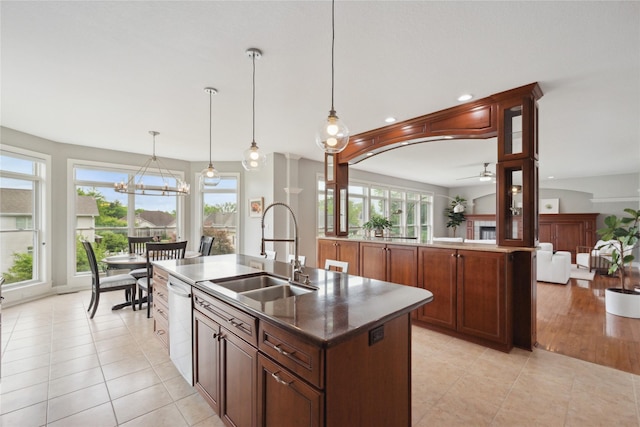 3322 Harrison Rd, Ames, IA 50010 - kitchen featuring a sink, stainless steel dishwasher, healthy amount of natural light, a kitchen island with sink, and recessed lighting