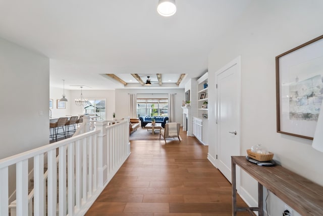901 Cardinal Dr, Polk City, IA 50226 - hall featuring wood finished floors and a raised ceiling