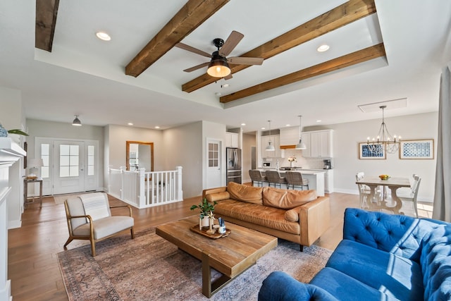 901 Cardinal Dr, Polk City, IA 50226 - living area with beam ceiling, recessed lighting, a chandelier, light wood finished floors, and a ceiling fan
