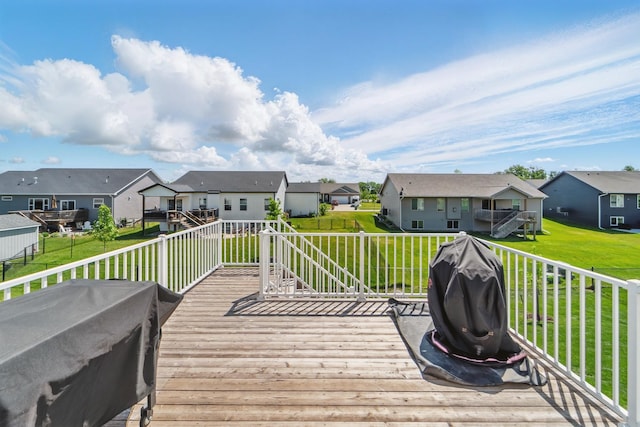 901 Cardinal Dr, Polk City, IA 50226 - wooden deck featuring a residential view and a yard