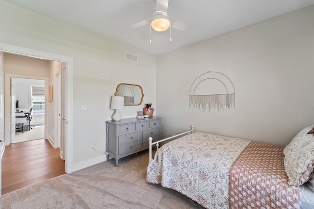 901 Cardinal Dr, Polk City, IA 50226 - bedroom featuring carpet flooring, ceiling fan, and baseboards