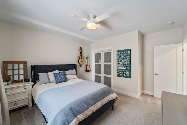 901 Cardinal Dr, Polk City, IA 50226 - bedroom with carpet, baseboards, and a ceiling fan