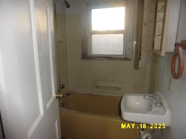 206 S D St, Indianola, IA 50125 - full bath with a sink and bathing tub / shower combination