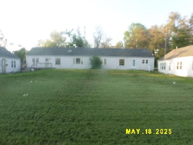206 S D St, Indianola, IA 50125 - back of house with a lawn