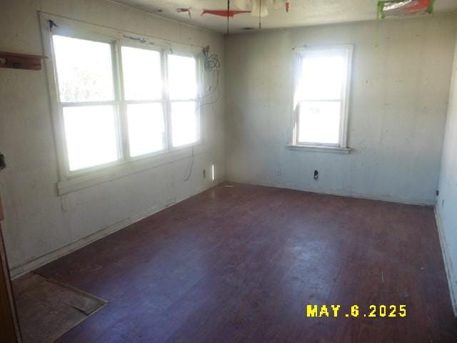 410 W 2nd Ave, Indianola, IA 50125 - unfurnished room featuring wood finished floors and a ceiling fan