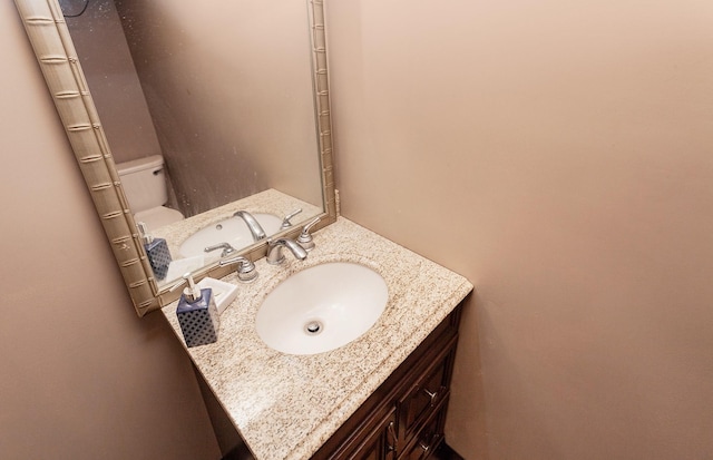 1309 Mccormick St, Des Moines, IA 50316 - bathroom featuring vanity and toilet