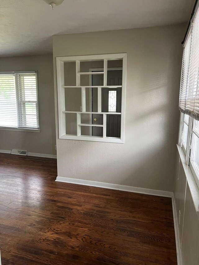 160 Bel Aire Dr, Waukee, IA 50263 - unfurnished room featuring dark wood finished floors and baseboards