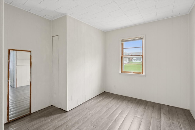 807 Center St, Grinnell, IA 50112 - unfurnished room featuring light wood-type flooring