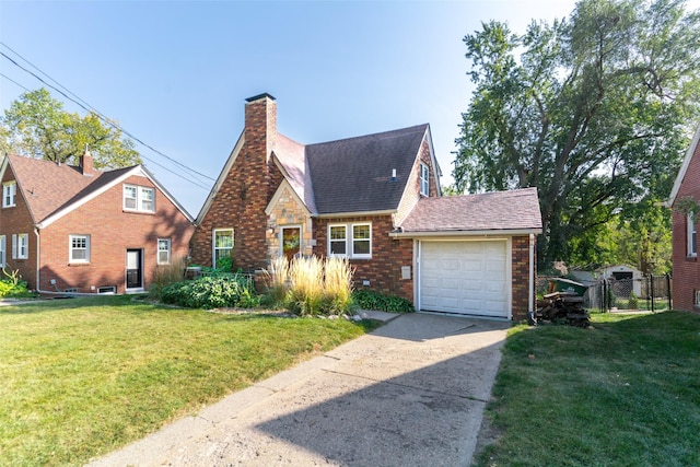 6704 Elmcrest Dr, Windsor Heights, IA 50324 - tudor home featuring driveway, brick siding, an attached garage, a chimney, and a shingled roof