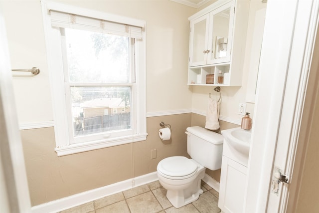 6704 Elmcrest Dr, Windsor Heights, IA 50324 - bathroom featuring vanity, toilet, baseboards, and tile patterned flooring