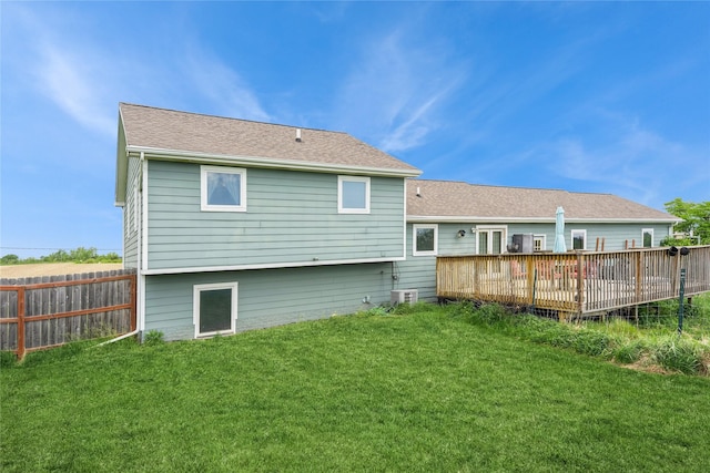 5545 E Douglas Ave, Des Moines, IA 50317 - rear view of property featuring a deck and roof with shingles