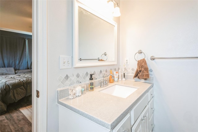5545 E Douglas Ave, Des Moines, IA 50317 - bathroom with vanity and ensuite bath