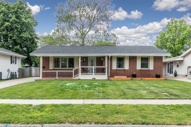 4120 65th St, Urbandale, IA 50322 - view of front of house featuring a porch, brick siding, central AC unit, and a shingled roof