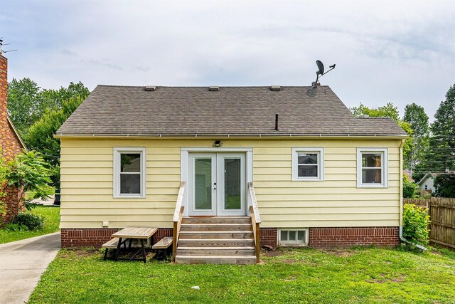 2004 40th St, Des Moines, IA 50310 - back of property featuring entry steps, french doors, and a shingled roof