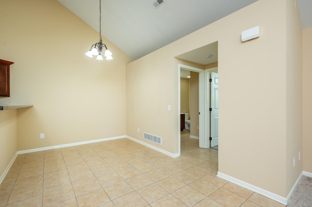 3305 SE Glenstone Dr Unit 236, Grimes, IA 50111 - unfurnished dining area featuring a chandelier, light tile patterned floors, baseboards, and high vaulted ceiling