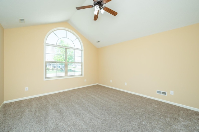 3305 SE Glenstone Dr Unit 236, Grimes, IA 50111 - carpeted empty room featuring lofted ceiling, a ceiling fan, and baseboards
