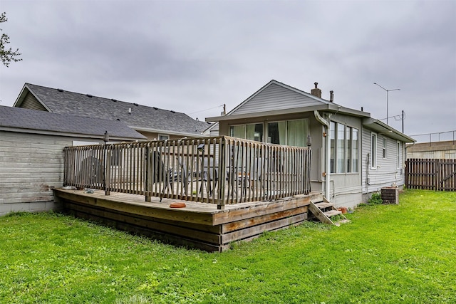 1410 E 21st St, Des Moines, IA 50317 - rear view of house with a deck and cooling unit