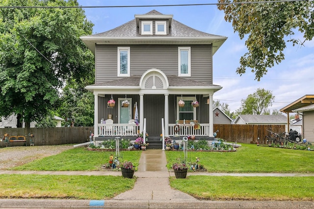 305 E State St, Baxter, IA 50028 - american foursquare style home featuring covered porch and roof with shingles