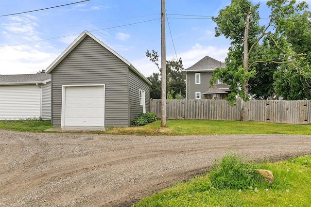305 E State St, Baxter, IA 50028 - garage featuring driveway