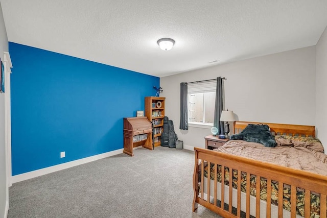 3911 NW 14th Ct, Ankeny, IA 50023 - bedroom with carpet, a textured ceiling, and baseboards