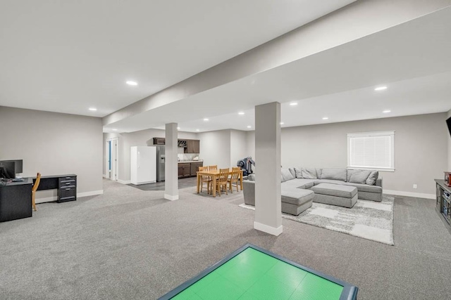 3911 NW 14th Ct, Ankeny, IA 50023 - recreation room featuring carpet flooring, baseboards, and recessed lighting