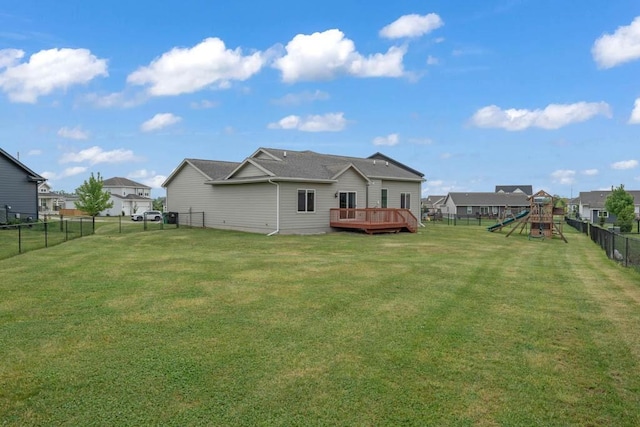 3911 NW 14th Ct, Ankeny, IA 50023 - back of house featuring a playground, a wooden deck, and a residential view