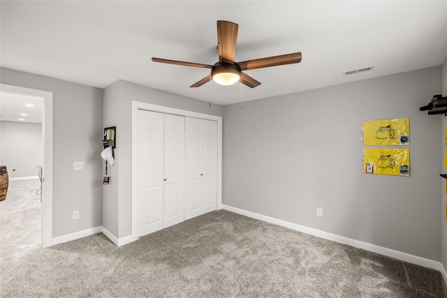 2320 SE Maxwell Dr, Waukee, IA 50263 - unfurnished bedroom with carpet flooring, a closet, baseboards, and ceiling fan