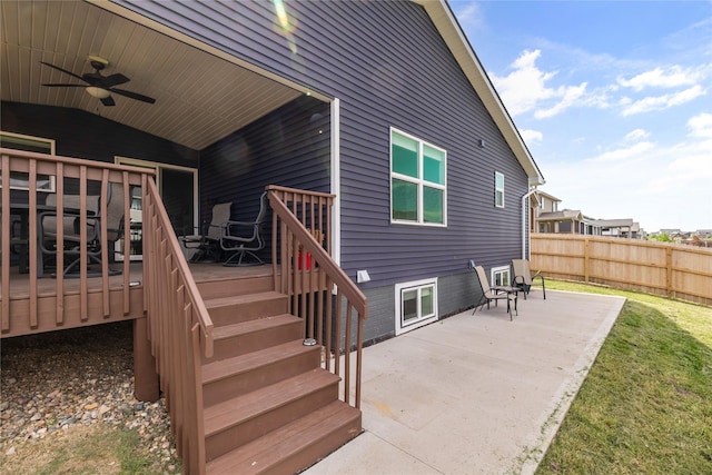 2320 SE Maxwell Dr, Waukee, IA 50263 - rear view of house with ceiling fan, a wooden deck, and a patio area