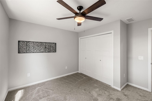 2320 SE Maxwell Dr, Waukee, IA 50263 - unfurnished bedroom featuring carpet, baseboards, a closet, and ceiling fan
