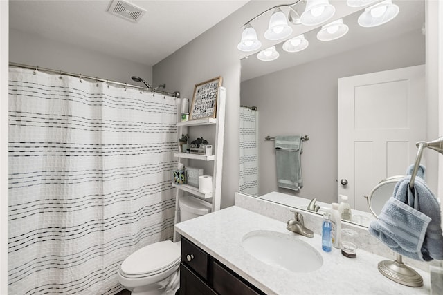 2320 SE Maxwell Dr, Waukee, IA 50263 - bathroom with toilet, vanity, and a shower with shower curtain