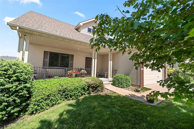 6814 Aubrey Ct, Johnston, IA 50131 - view of front of home featuring covered porch, roof with shingles, an attached garage, and a front lawn