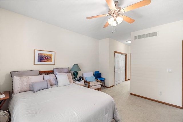 6814 Aubrey Ct, Johnston, IA 50131 - bedroom featuring light colored carpet, baseboards, a ceiling fan, and a closet