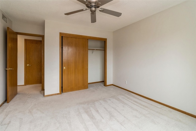 4400 Ep True Pkwy Unit 4, West Des Moines, IA 50265 - unfurnished bedroom with light carpet, a closet, baseboards, and ceiling fan