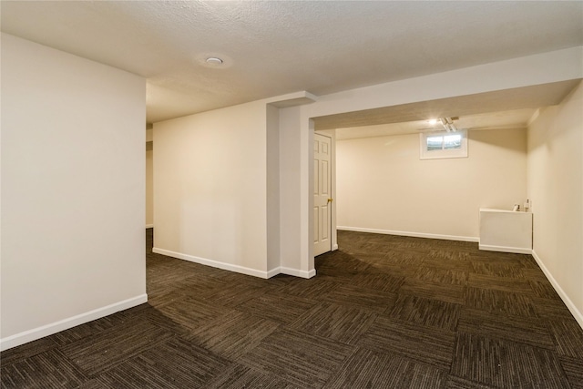 4400 Ep True Pkwy Unit 4, West Des Moines, IA 50265 - basement featuring baseboards and dark colored carpet