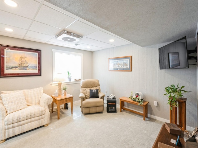 812 W 2nd St S, Newton, IA 50208 - living area featuring carpet, baseboards, and recessed lighting