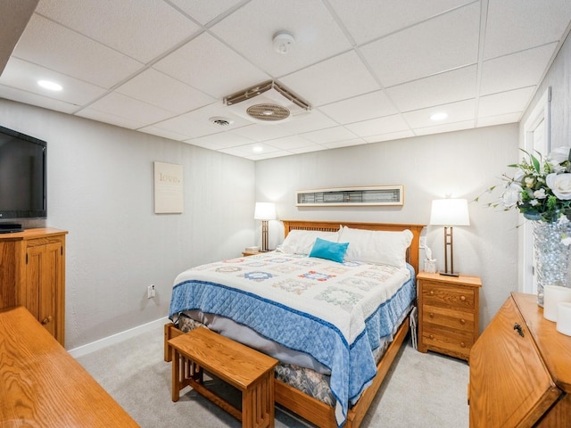 812 W 2nd St S, Newton, IA 50208 - bedroom with light carpet, a drop ceiling, and baseboards