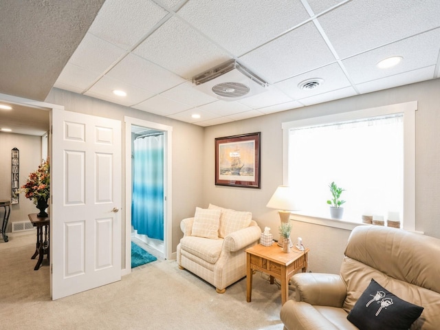 812 W 2nd St S, Newton, IA 50208 - sitting room featuring carpet floors, a drop ceiling, and recessed lighting