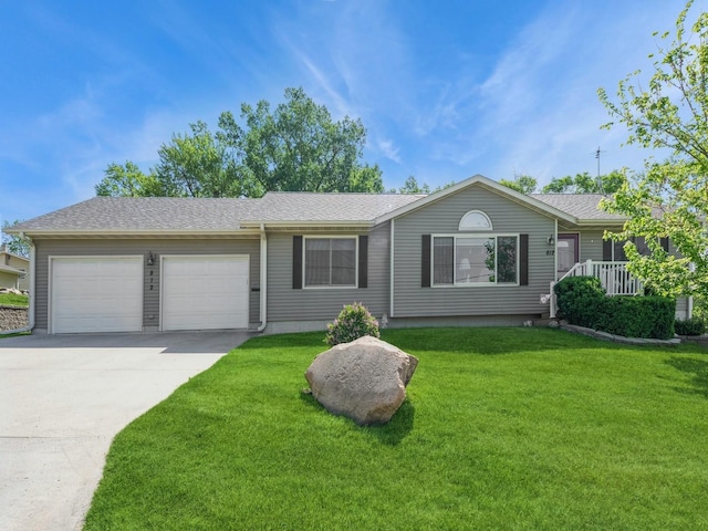 812 W 2nd St S, Newton, IA 50208 - single story home featuring a garage, driveway, a front lawn, and a shingled roof