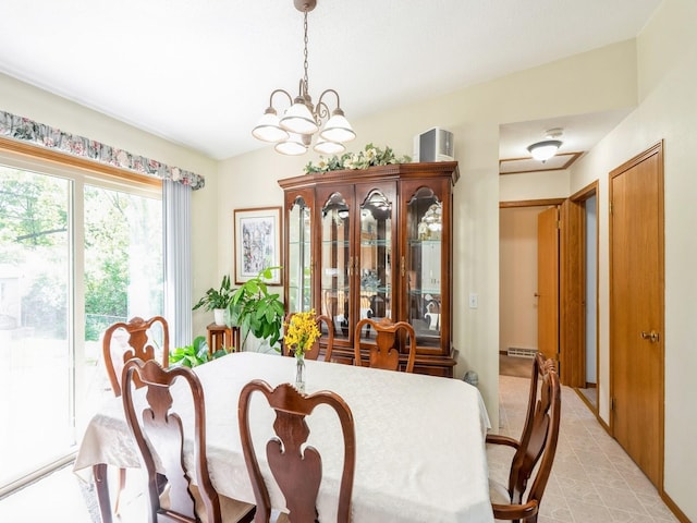 812 W 2nd St S, Newton, IA 50208 - dining room featuring a chandelier
