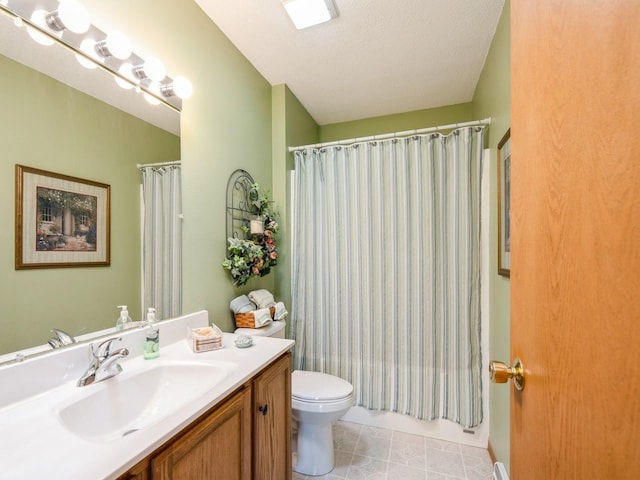 812 W 2nd St S, Newton, IA 50208 - full bath featuring vanity, toilet, tile patterned floors, and a textured ceiling