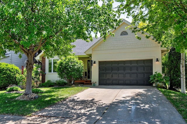 4670 Meadow Valley Dr, West Des Moines, IA 50265 - view of front of house featuring driveway, a garage, a shingled roof, and a front lawn