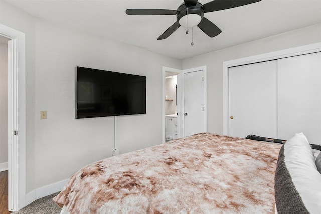 4670 Meadow Valley Dr, West Des Moines, IA 50265 - bedroom with baseboards, a closet, connected bathroom, ceiling fan, and carpet