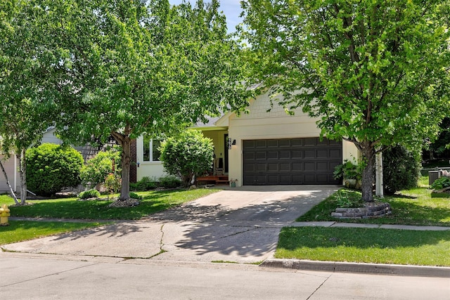 4670 Meadow Valley Dr, West Des Moines, IA 50265 - obstructed view of property with a garage, concrete driveway, a front lawn, and cooling unit