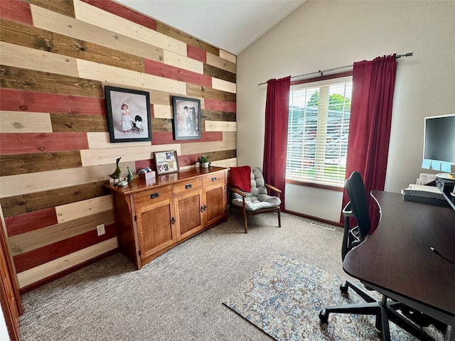 1008 Pine Brooke Ct, Clear Lake, IA 50428 - office space featuring wood walls, vaulted ceiling, and carpet floors