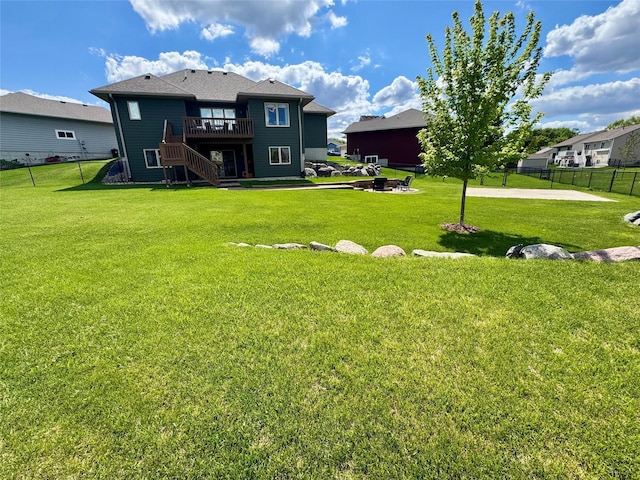 1008 Pine Brooke Ct, Clear Lake, IA 50428 - view of yard featuring stairs and a deck
