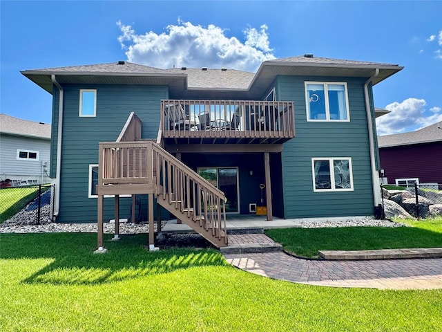 1008 Pine Brooke Ct, Clear Lake, IA 50428 - rear view of property with a patio, stairway, and a deck