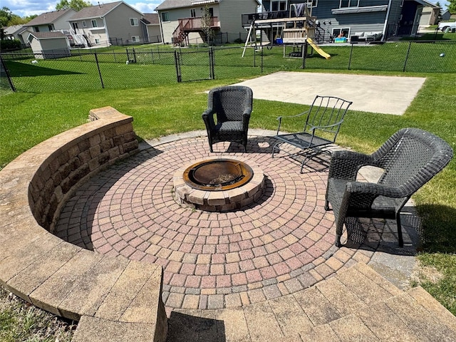 1008 Pine Brooke Ct, Clear Lake, IA 50428 - view of patio featuring an outdoor fire pit and a residential view