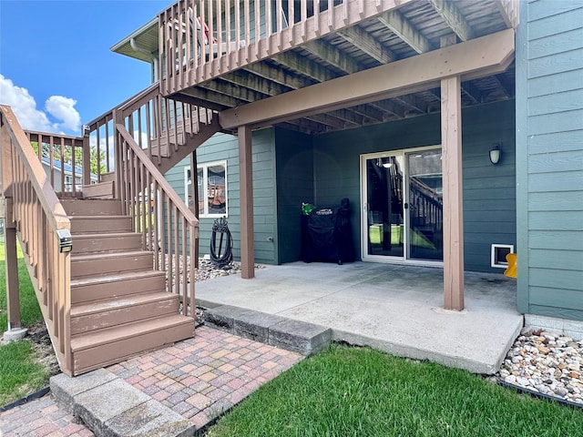 1008 Pine Brooke Ct, Clear Lake, IA 50428 - view of patio / terrace with stairs and a deck